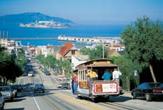 Tram travelling along a road, San Francisco